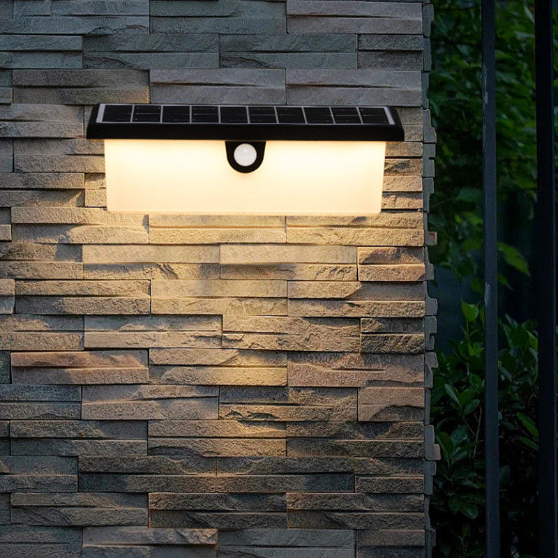 Lámpara de pared solar impermeable LED exterior sensor de movimiento lámpara de decoración para montaje de pared de jardín