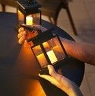 Una luz de paisaje solar para la atmósfera retro exterior impermeable luz de vela jardín